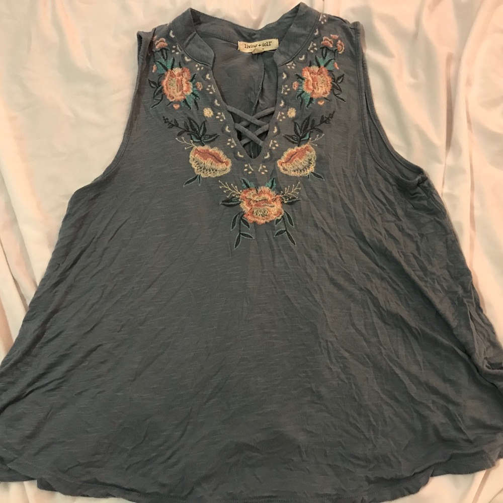 Embroidered flowy tank.